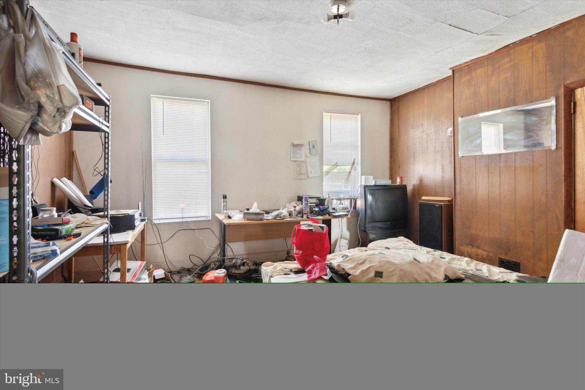 4800 Merion Avenue Philadelphia, PA 19131 - Photo 15 of 15 a bed room with a bed and a couch