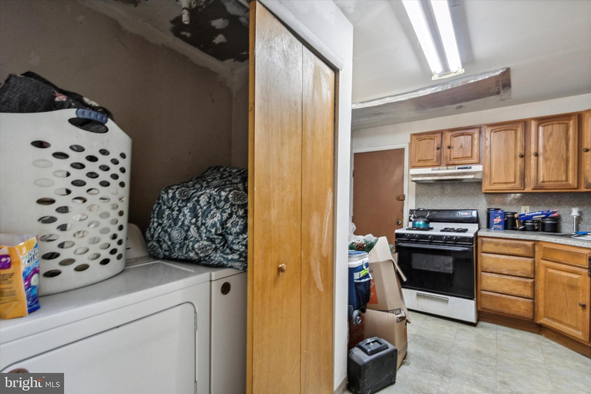 4800 Merion Avenue Philadelphia, PA 19131 - Photo 8 of 15 a kitchen with stainless steel appliances a stove a sink and a refrigerator