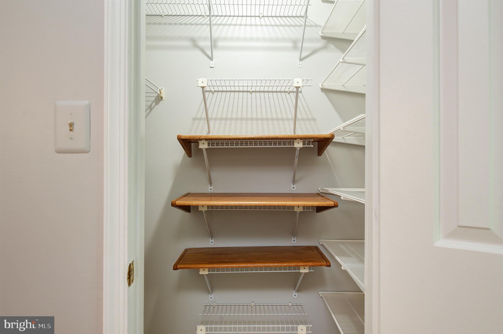 2217 Lovedale Lane, Unit J Reston, VA 20191 - Photo 16 of 33 Second bedroom closet with closet systems