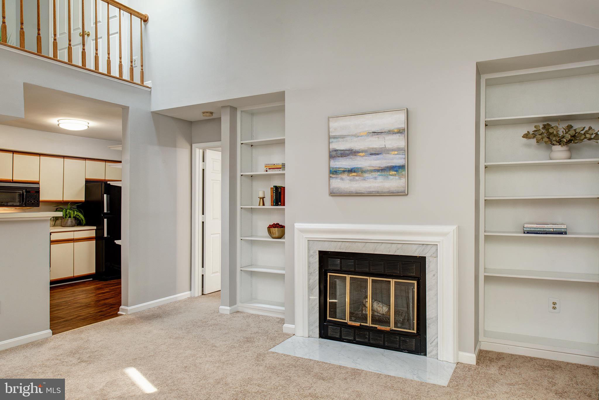2217 Lovedale Lane, Unit J Reston, VA 20191 - Photo 5 of 33 Wood burning fireplace for cozy fall nights