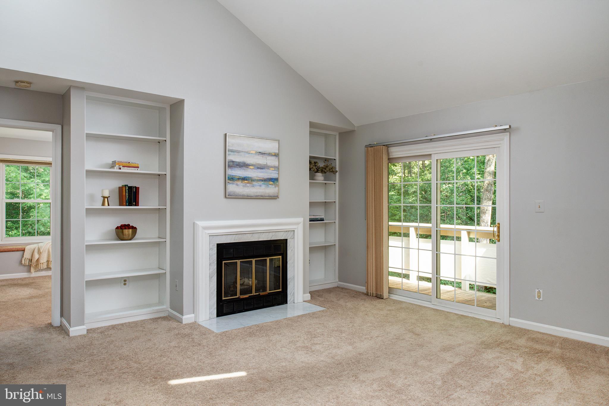 2217 Lovedale Lane, Unit J Reston, VA 20191 - Photo 6 of 33 Open Livingroom opens to balcony and woods