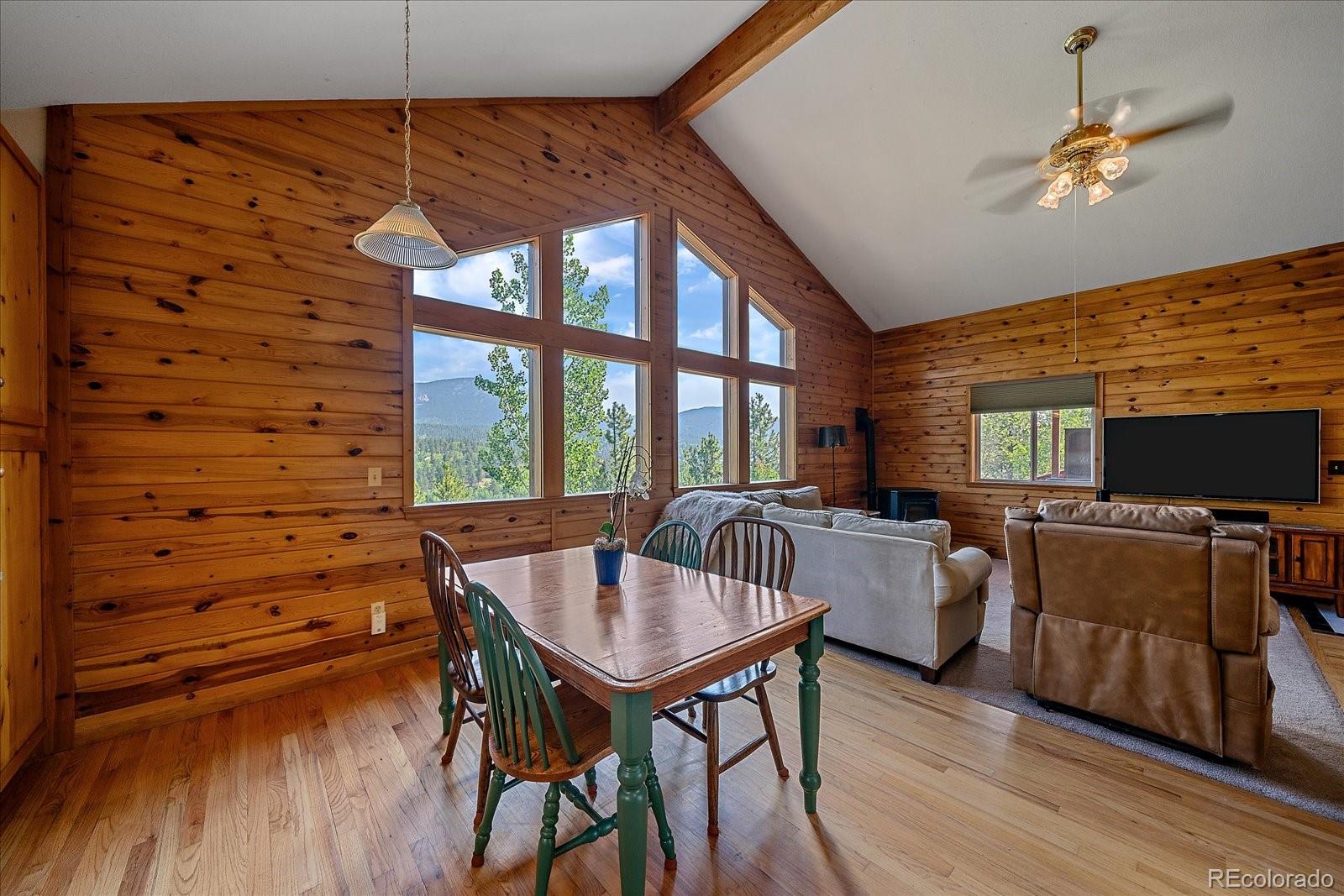 153 Wise Road Bailey, CO 80421 - Photo 13 of 38 a view of a livingroom with furniture window and wooden floor