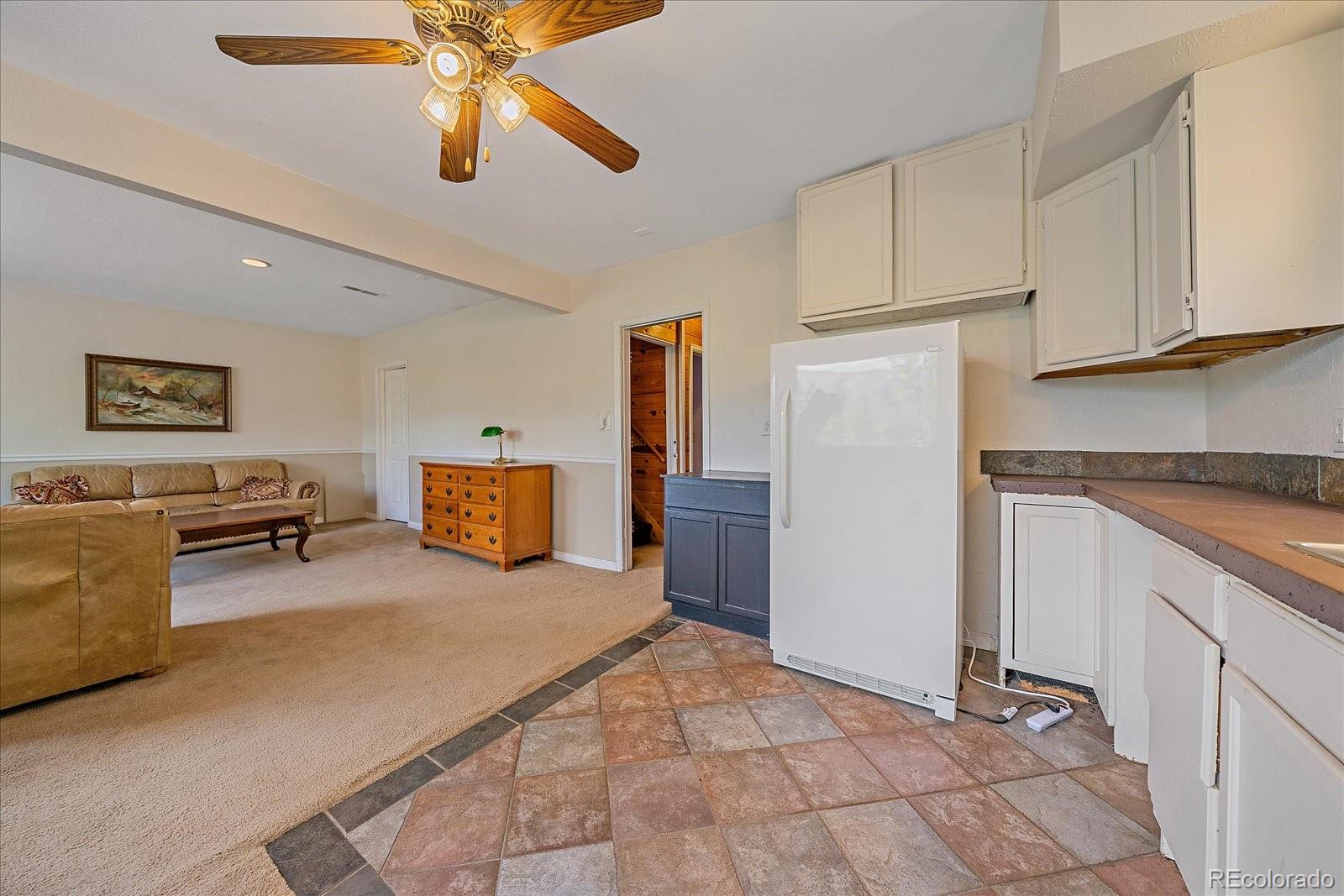 153 Wise Road Bailey, CO 80421 - Photo 22 of 38 a view of a livingroom with furniture and cabinet