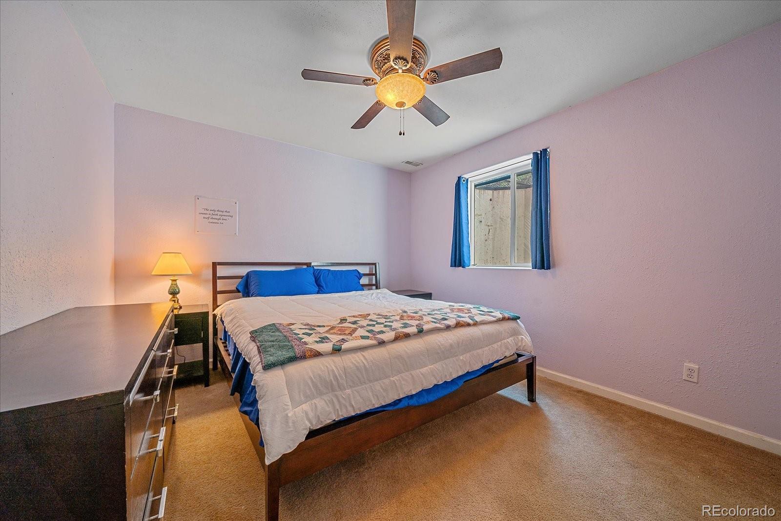 153 Wise Road Bailey, CO 80421 - Photo 24 of 38 a bedroom with a bed and window