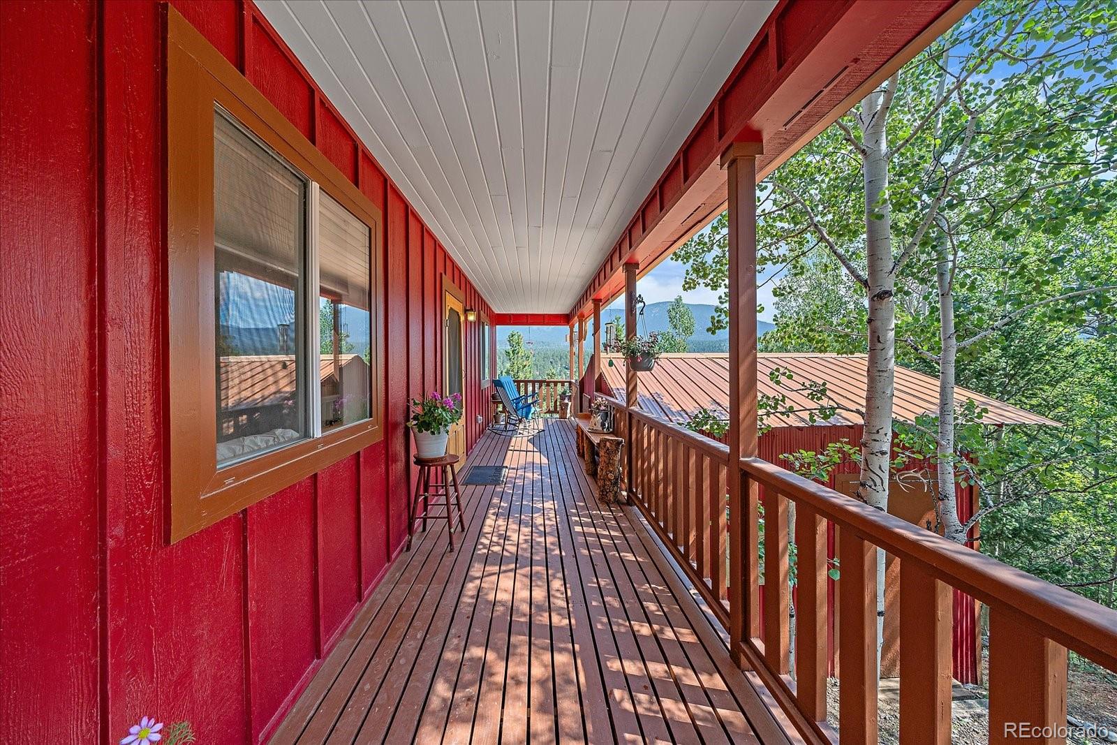 153 Wise Road Bailey, CO 80421 - Photo 3 of 38 a view of city with balcony