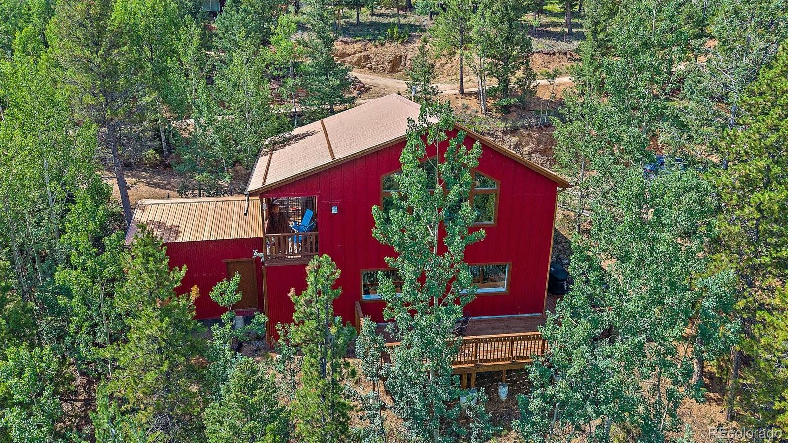 153 Wise Road Bailey, CO 80421 - Photo 31 of 38 an aerial view of a house
