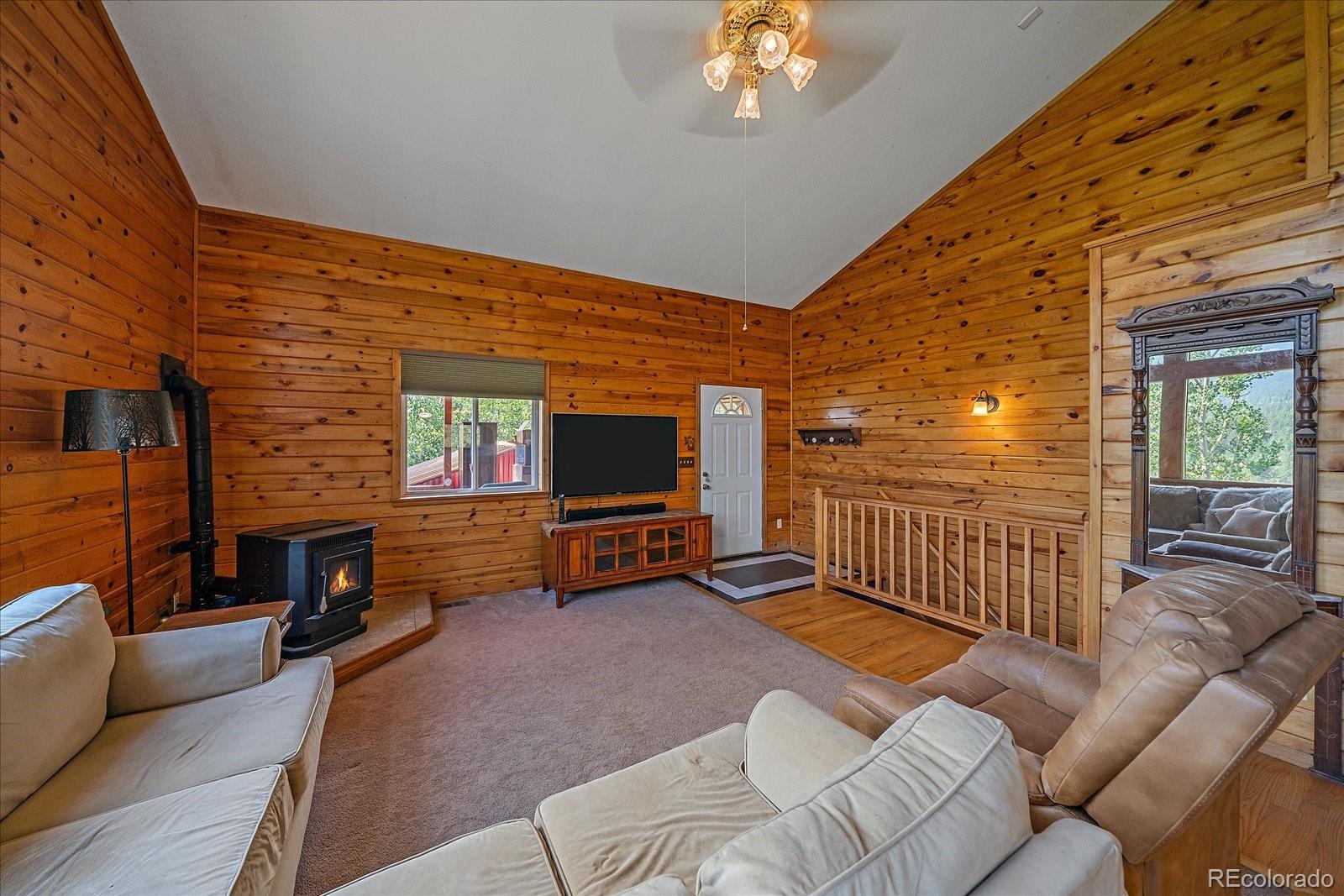 153 Wise Road Bailey, CO 80421 - Photo 8 of 38 a outdoor living space with furniture