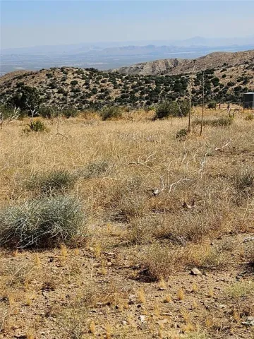 a view of an outdoor space and mountain view