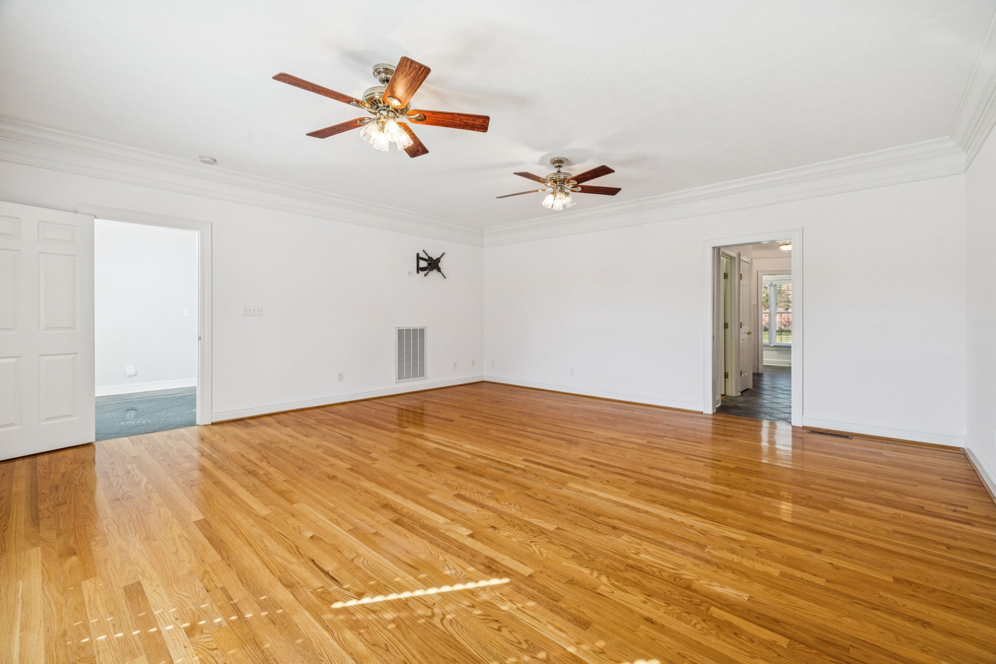 149 Upper Station Camp Creek Road Gallatin, TN 37066 - Photo 17 of 83 a view of an empty room with a ceiling fan