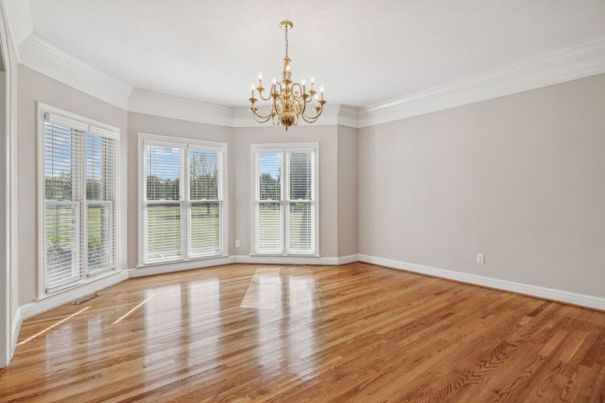 149 Upper Station Camp Creek Road Gallatin, TN 37066 - Photo 28 of 83 a view of an empty room with wooden floor and a window