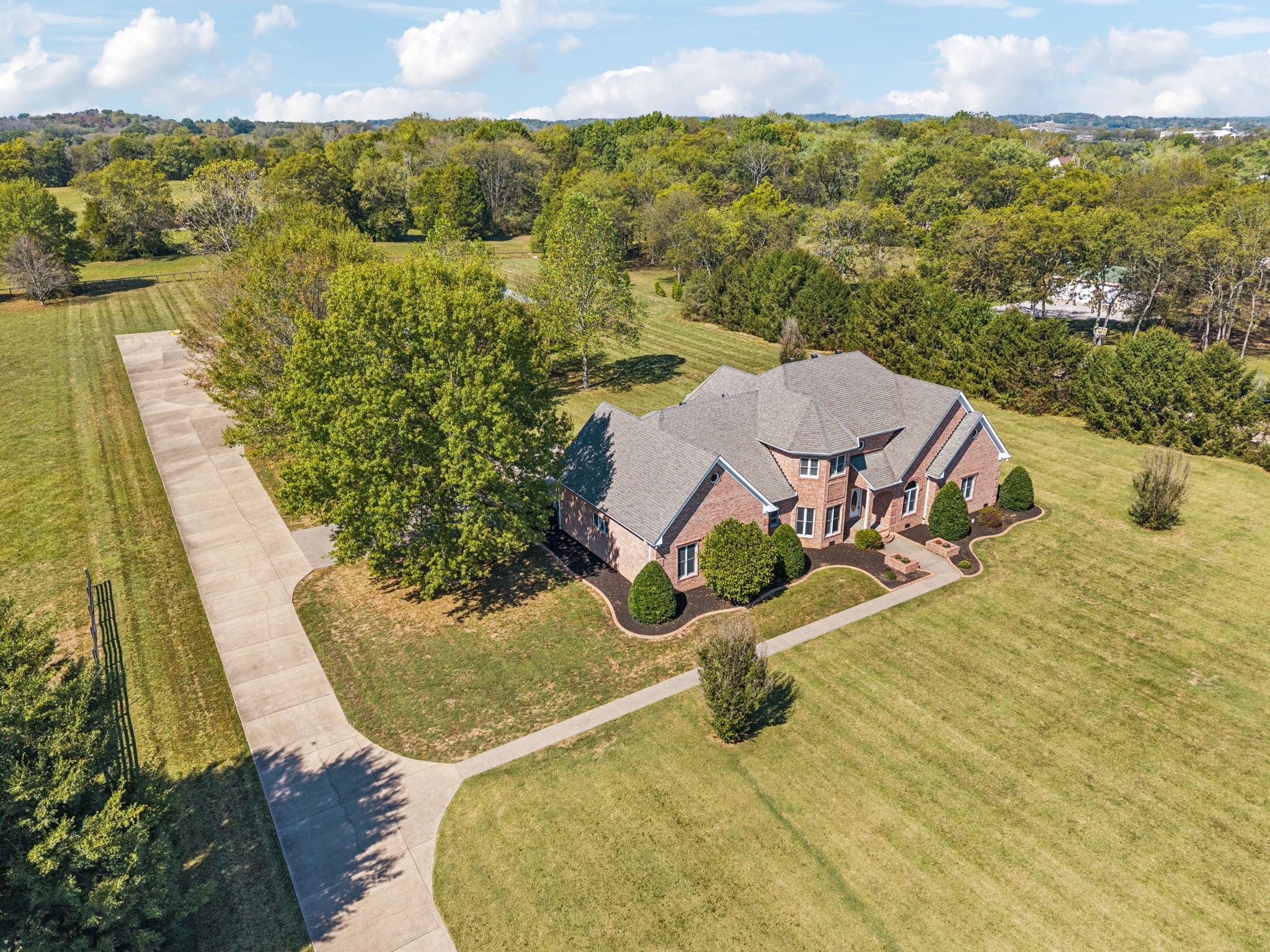 149 Upper Station Camp Creek Road Gallatin, TN 37066 - Photo 3 of 83 an aerial view of a house with swimming pool and ocean view
