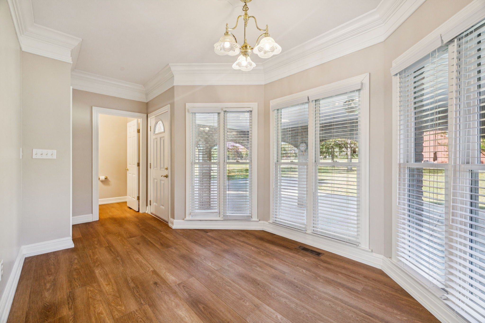 149 Upper Station Camp Creek Road Gallatin, TN 37066 - Photo 36 of 83 a view of a bedroom with wooden floor and windows