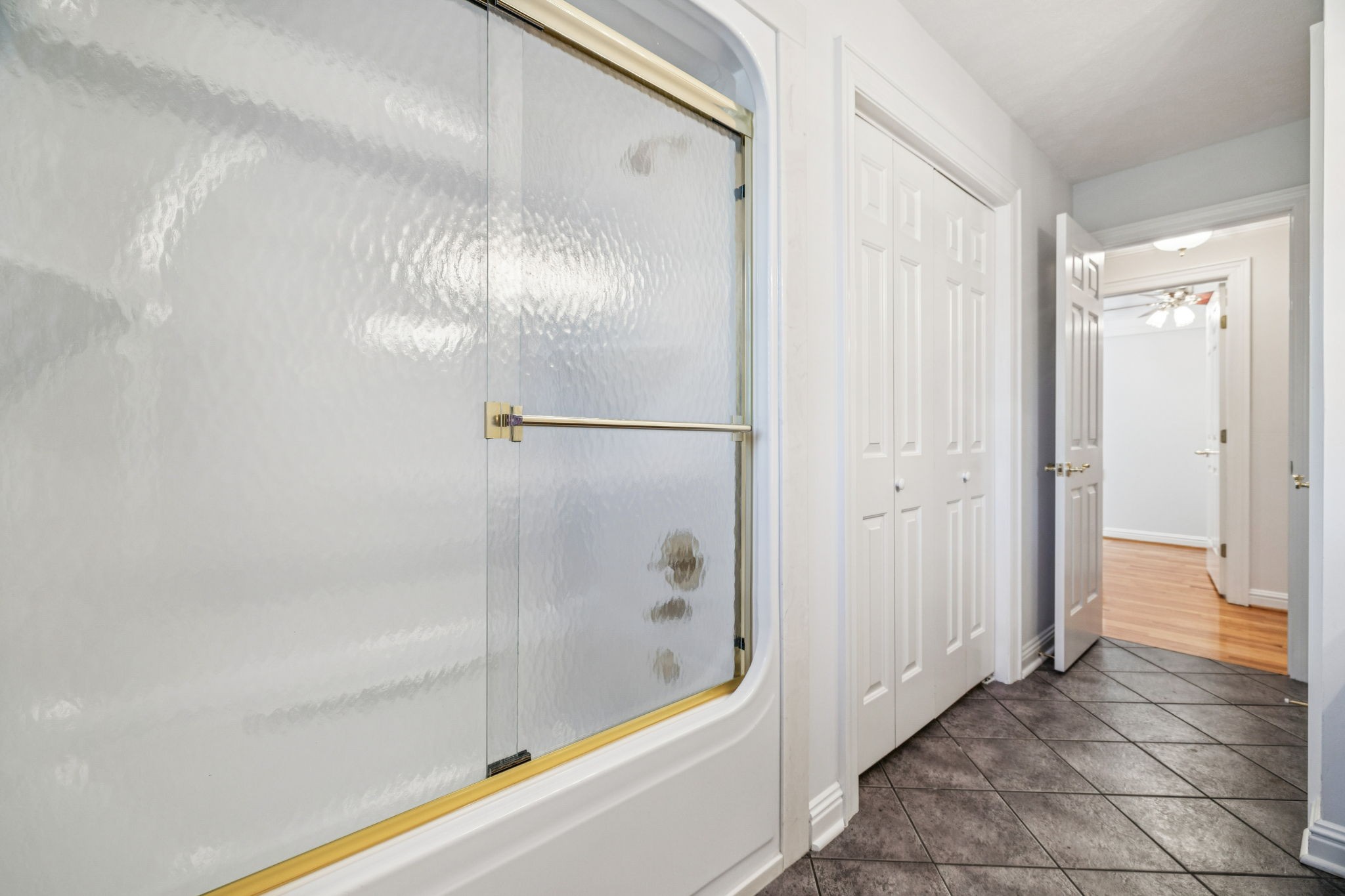 149 Upper Station Camp Creek Road Gallatin, TN 37066 - Photo 48 of 83 a bathroom with a bathtub and shower