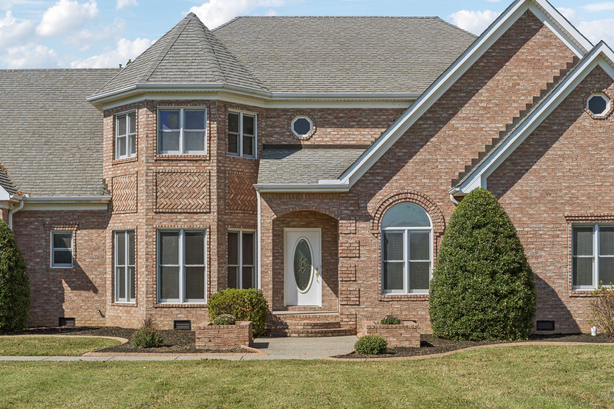 149 Upper Station Camp Creek Road Gallatin, TN 37066 - Photo 7 of 83 front view of a house with a yard