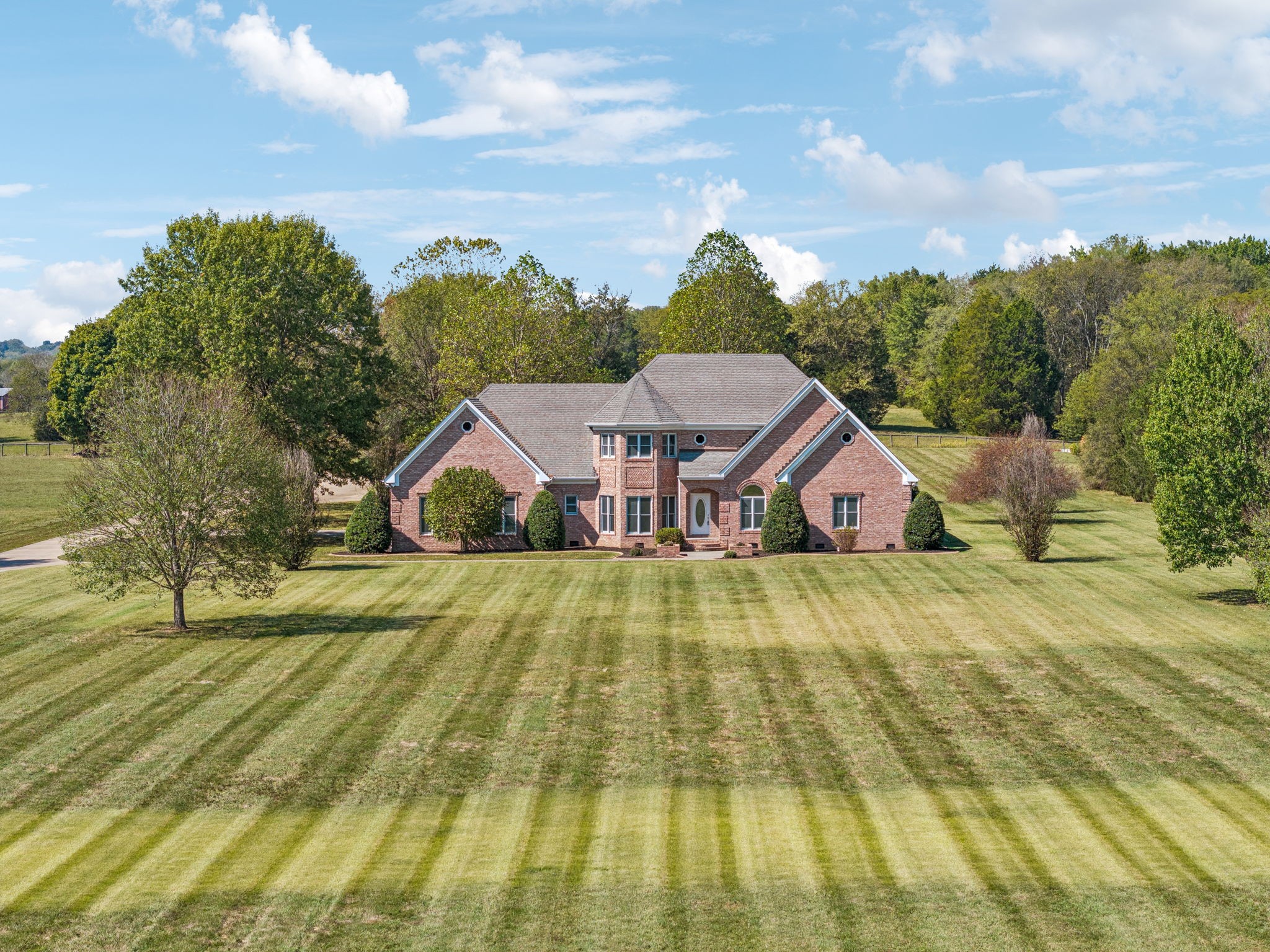 149 Upper Station Camp Creek Road Gallatin, TN 37066 - Photo 77 of 83 a view of a swimming pool with a garden