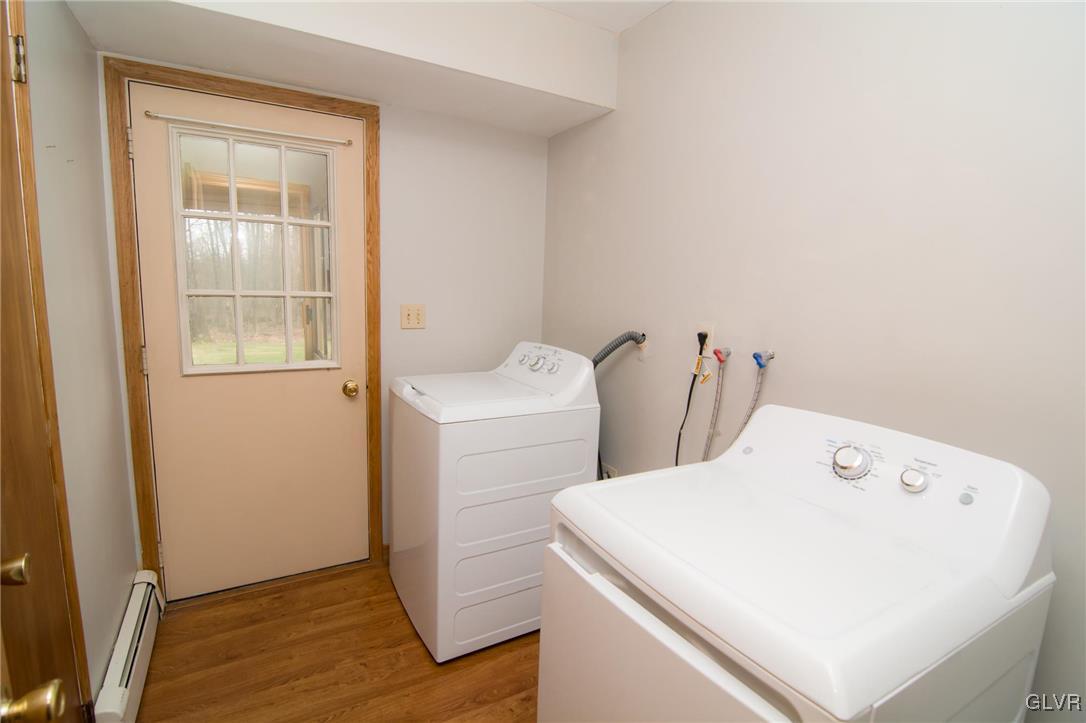 128 Elm Road Allentown, PA 18104 - Photo 22 of 47 1st floor laundry room with access to the back por