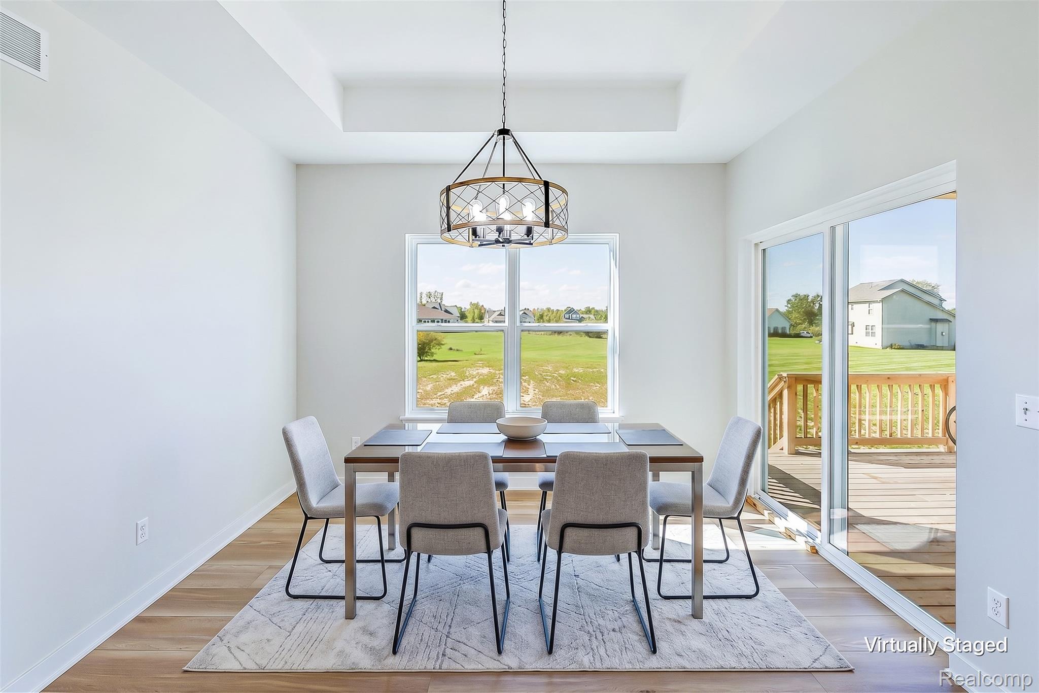 2878 Clivedon Road Howell, MI 48843 - Photo 12 of 41 DINING AREA VIRTUALLY STAGED W/AI