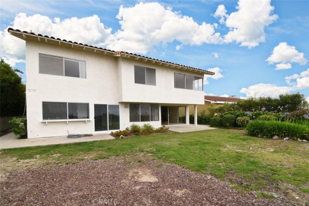 6803 Verde Ridge Road Rancho Palos Verdes, CA 90275 - Photo 26 of 26 a view of a house with backyard and garden