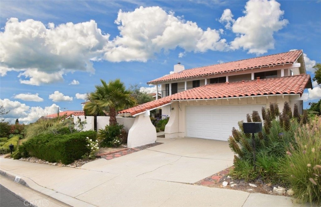 6803 Verde Ridge Road Rancho Palos Verdes, CA 90275 - Photo 5 of 26 a house with trees in front of it