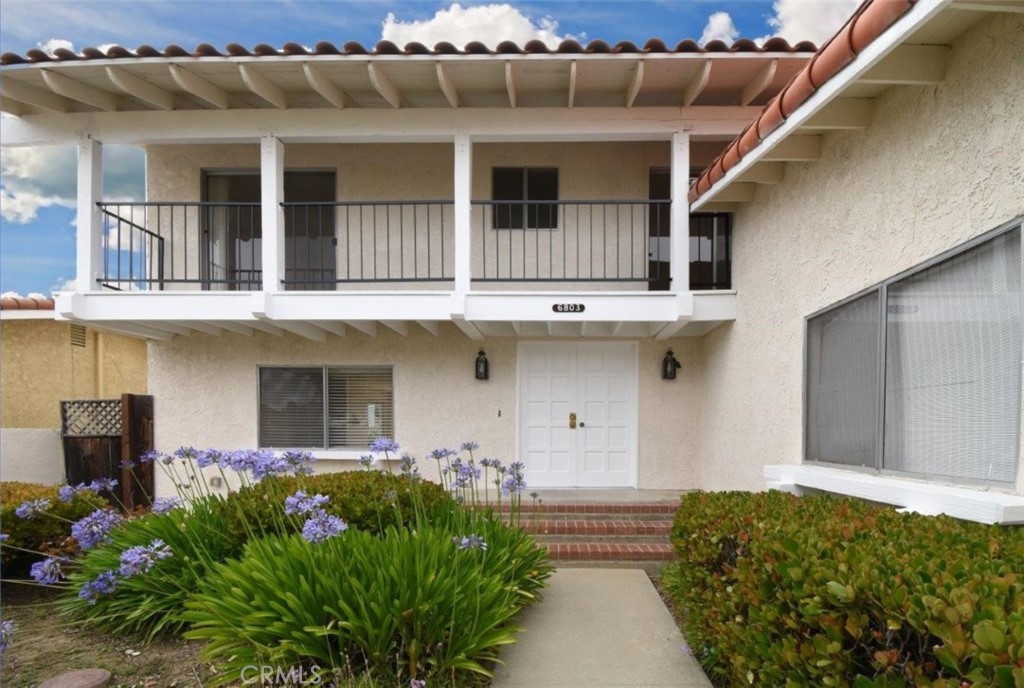 6803 Verde Ridge Road Rancho Palos Verdes, CA 90275 - Photo 6 of 26 a front view of a house with garden