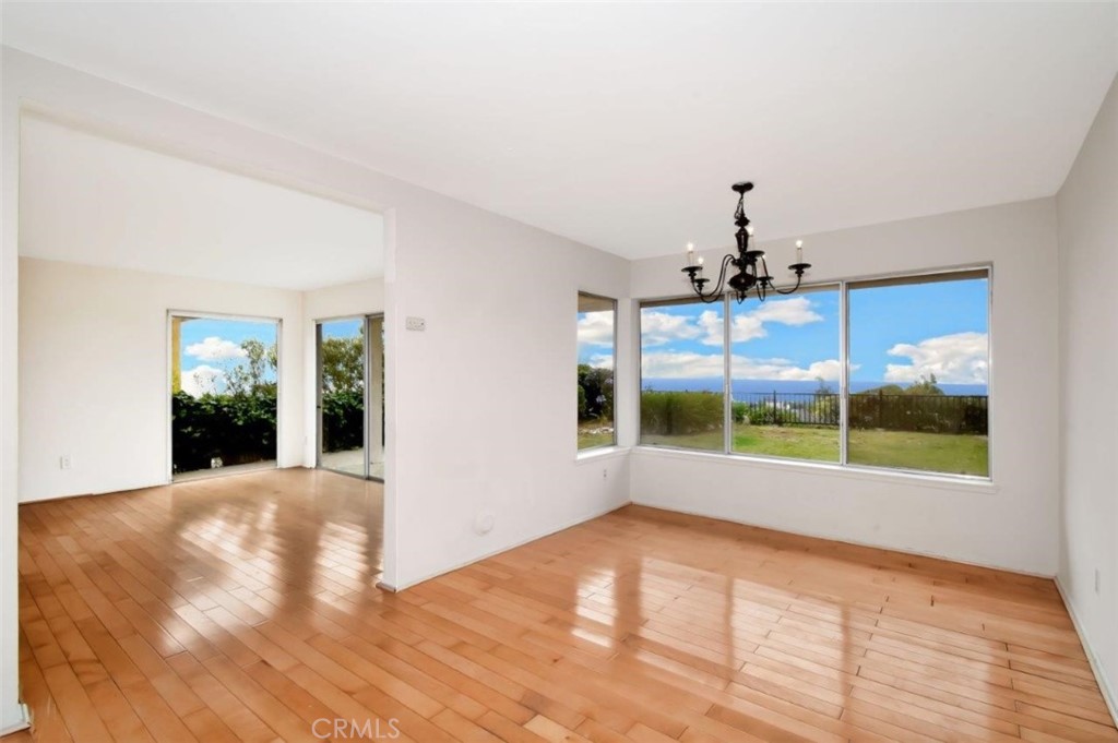 6803 Verde Ridge Road Rancho Palos Verdes, CA 90275 - Photo 9 of 26 a view of an empty room with a windows and plants
