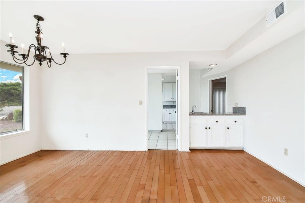 6803 Verde Ridge Road Rancho Palos Verdes, CA 90275 - Photo 10 of 26 a view of a room with wooden floor and cabinet