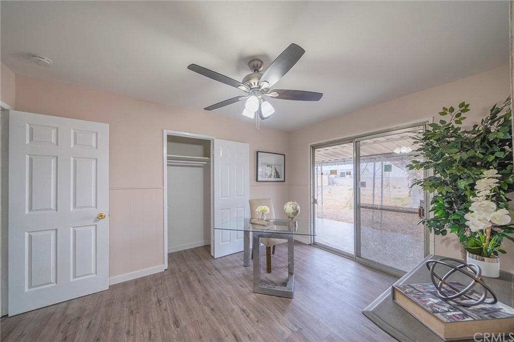 10941 Mac Street Anaheim, CA 92804 - Photo 20 of 41 a view of a livingroom with furniture and a workspace