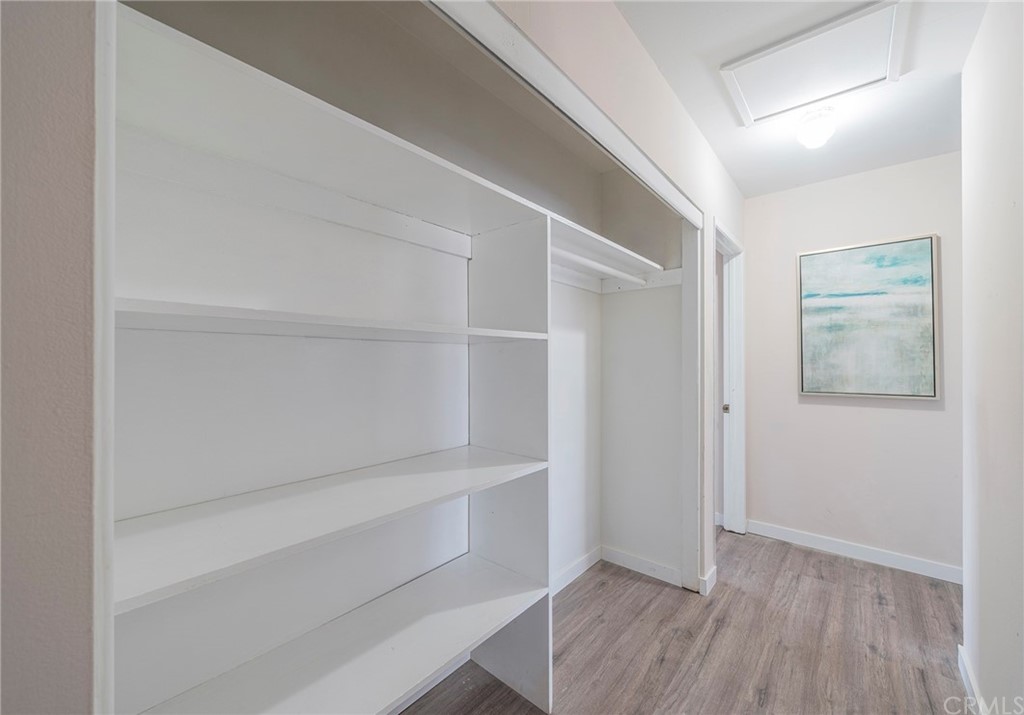 10941 Mac Street Anaheim, CA 92804 - Photo 32 of 41 a view of an empty walk in closet