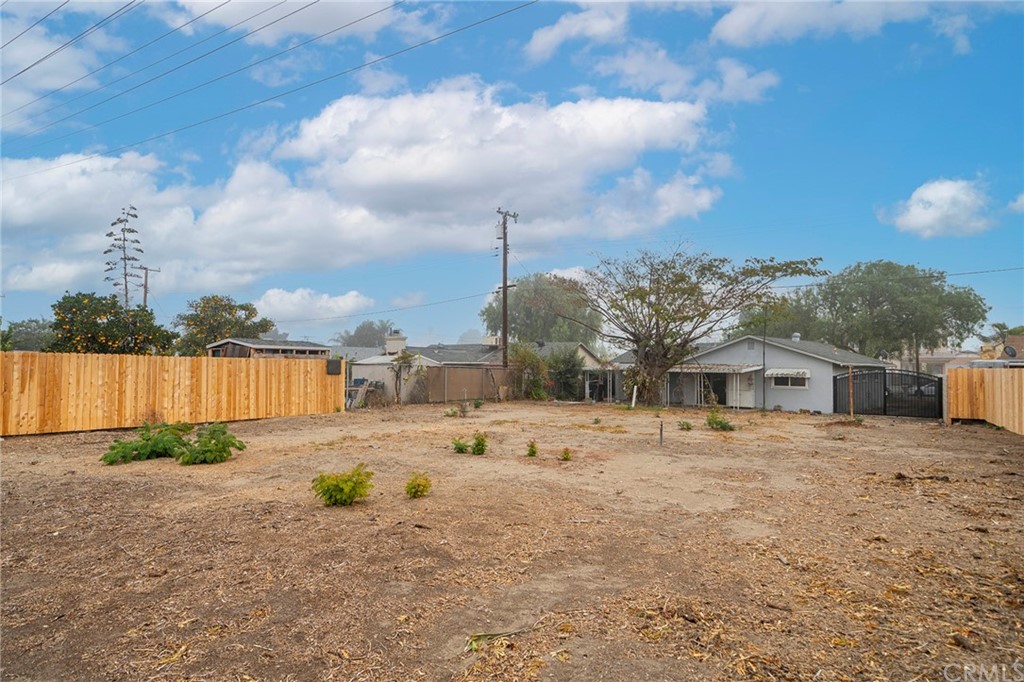 10941 Mac Street Anaheim, CA 92804 - Photo 40 of 41 a view of a dry yard with a house