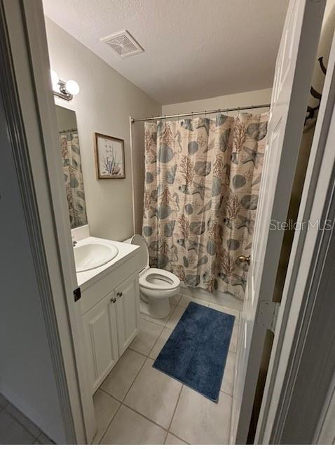 8369 Wingate Drive, Unit 2114 Sarasota, FL 34238 - Photo 18 of 26 a bathroom with a sink and a mirror