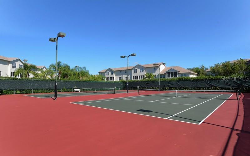 8369 Wingate Drive, Unit 2114 Sarasota, FL 34238 - Photo 25 of 26 a view of a tennis court