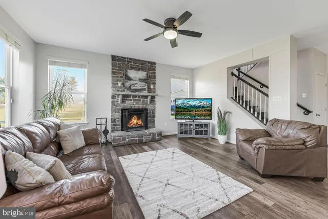 a en suite bathroom with a tub sink and mirror