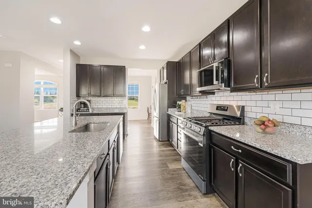 a view of a park with large trees