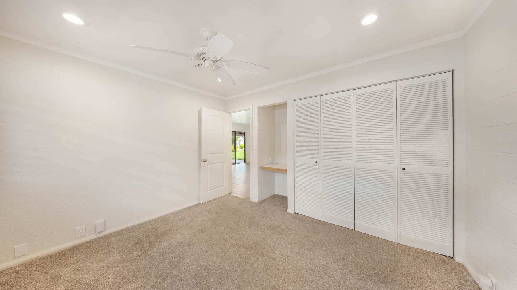 328 Molo Street Kapaa, HI 96746 - Photo 20 of 30 an empty room with a ceiling fan and closet area