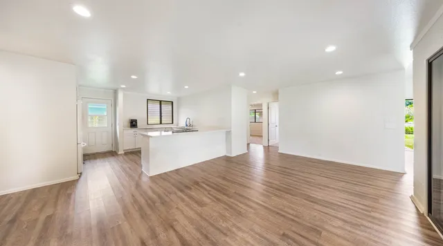 a view of kitchen with wooden floor