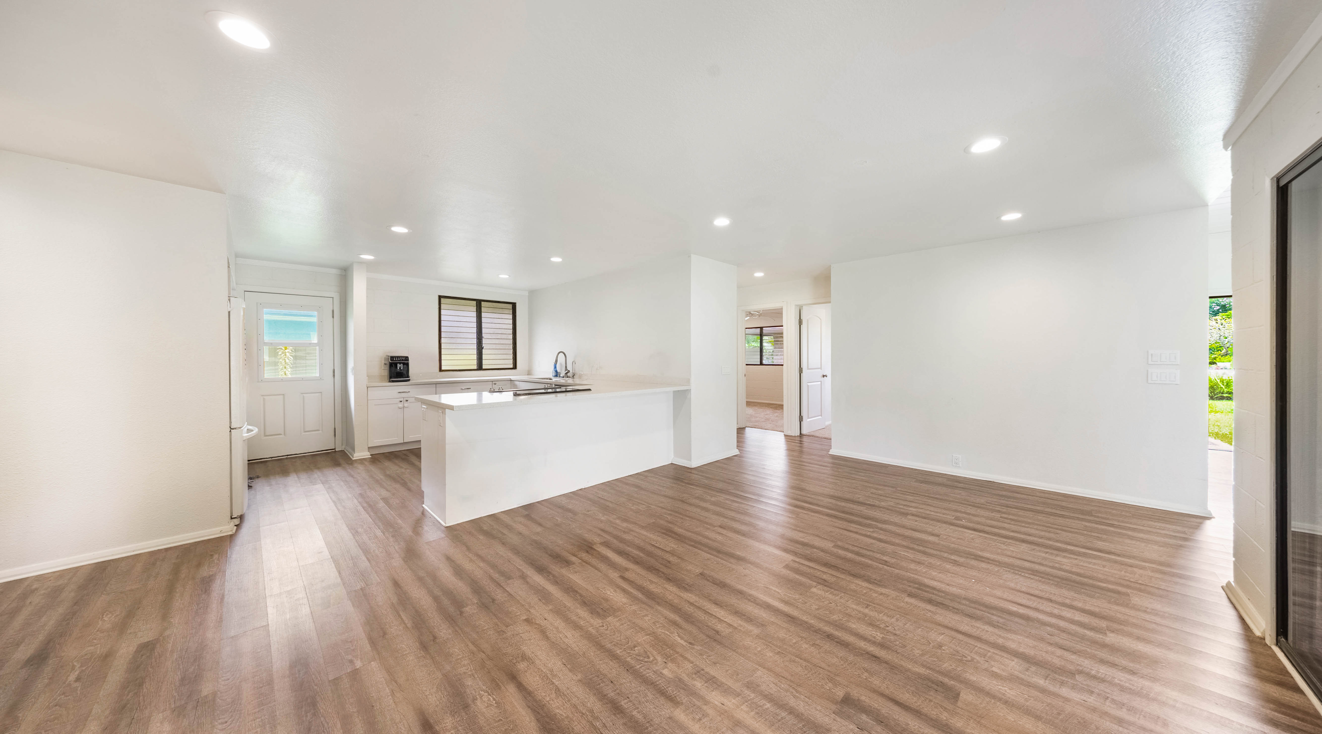 328 Molo Street Kapaa, HI 96746 - Photo 21 of 30 a view of kitchen with wooden floor