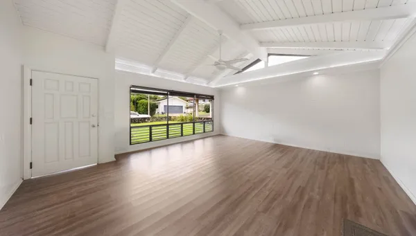 a view of a livingroom with wooden floor