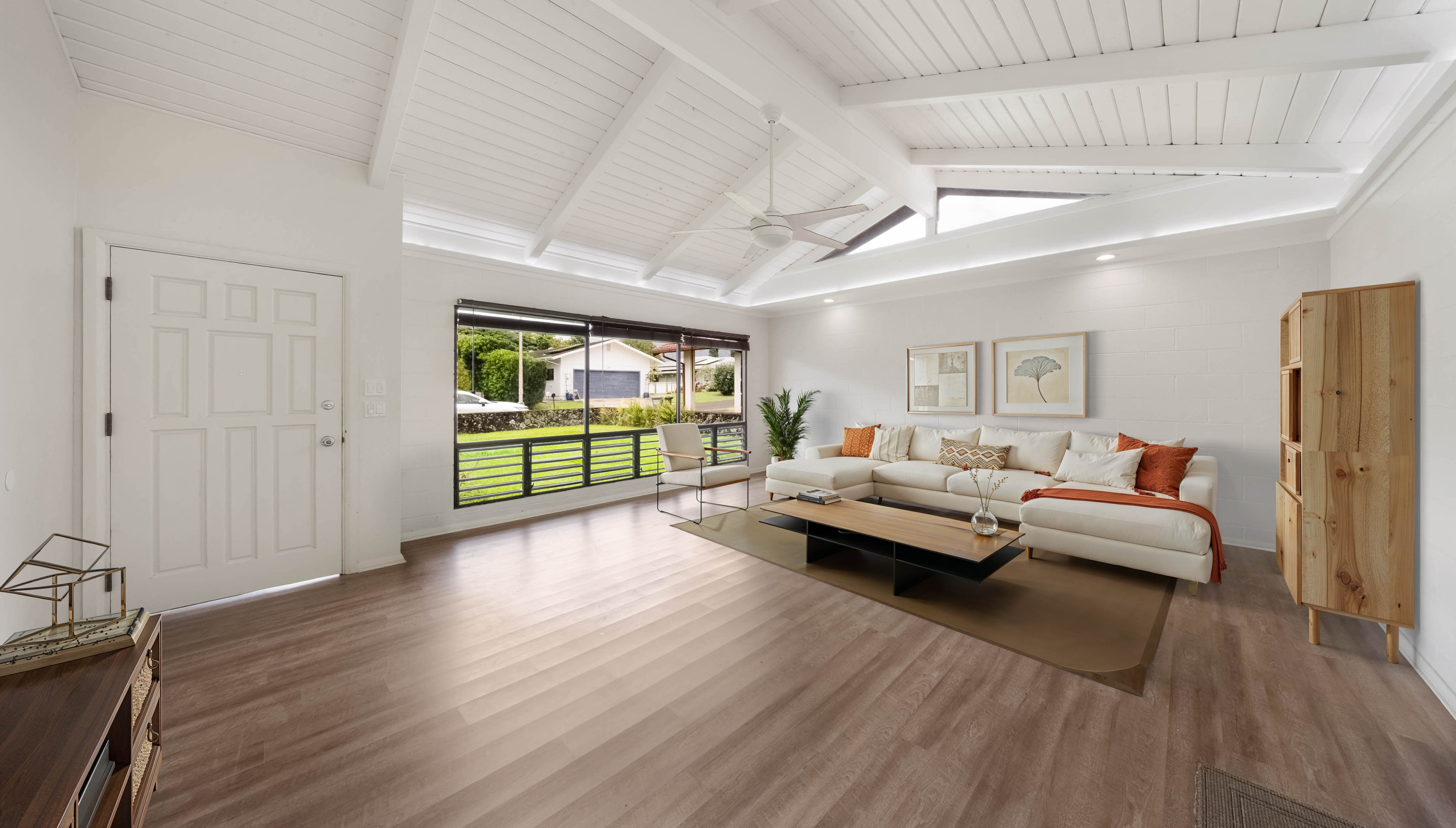 328 Molo Street Kapaa, HI 96746 - Photo 4 of 30 a living room with furniture and a floor to ceiling window