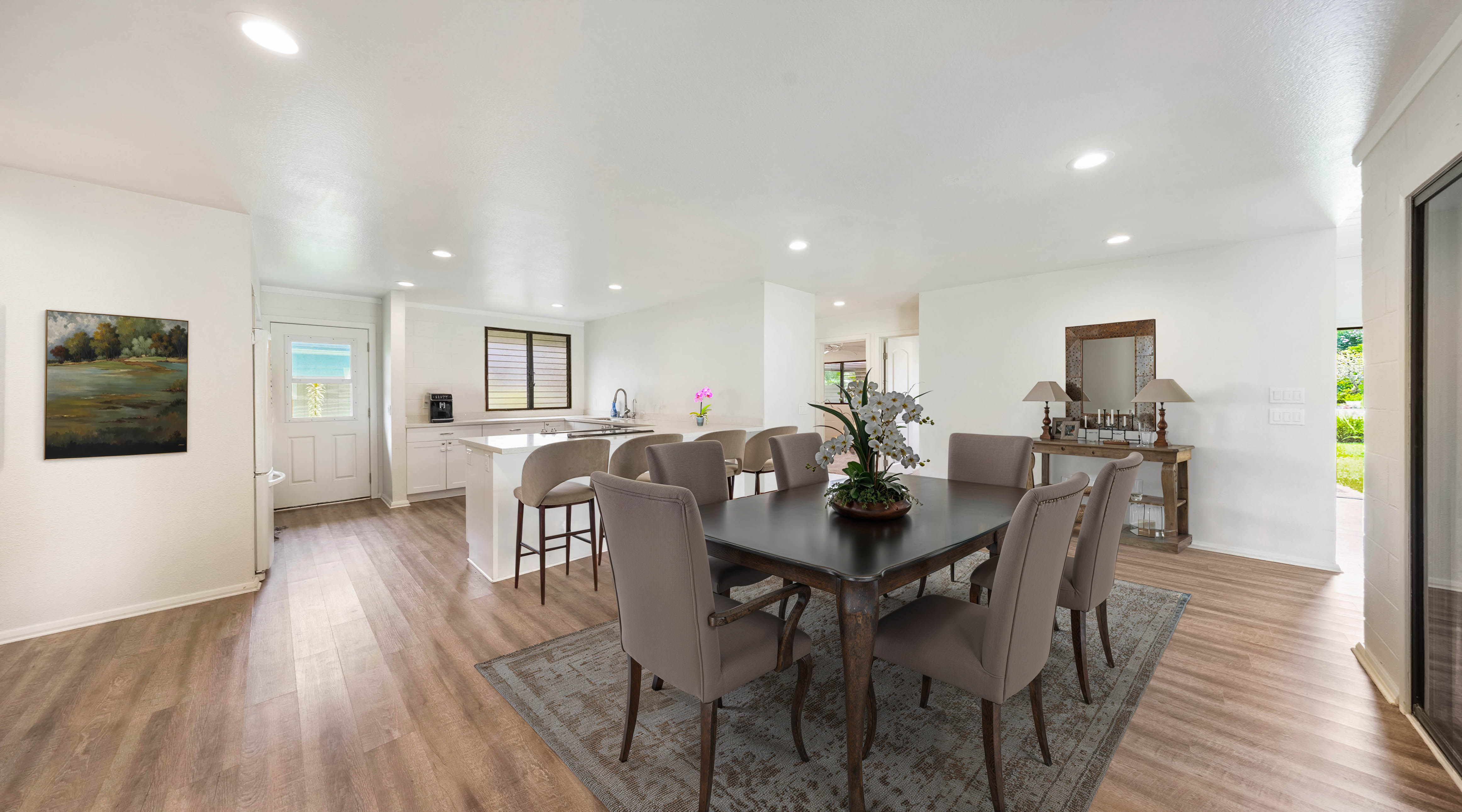 328 Molo Street Kapaa, HI 96746 - Photo 8 of 30 a view of a dining room with furniture and wooden floor