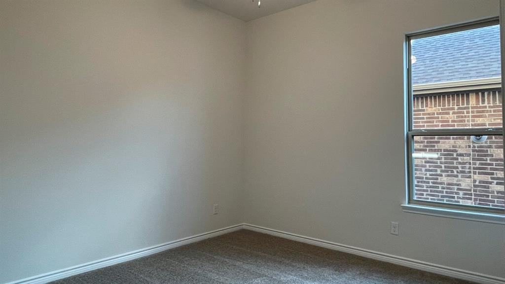 4189 Rim Trail Forney, TX 75126 - Photo 12 of 17 a small space with a window