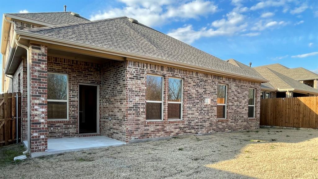 4189 Rim Trail Forney, TX 75126 - Photo 16 of 17 a front view of a house with large windows