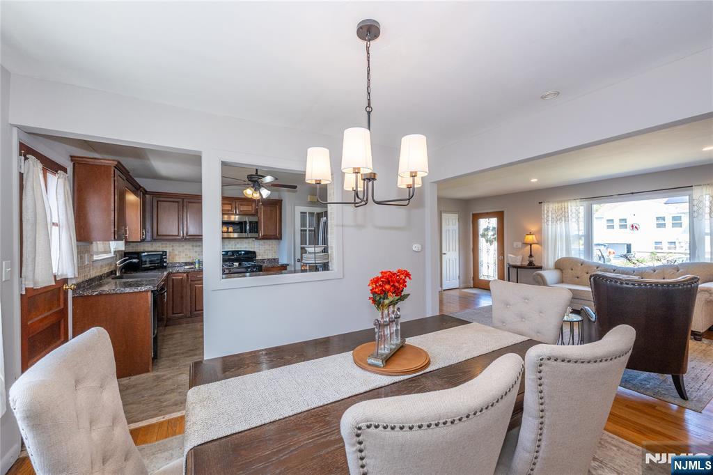 54 Harrison Street Dumont, NJ 07628 - Photo 10 of 35 a dining room filled with furniture and window