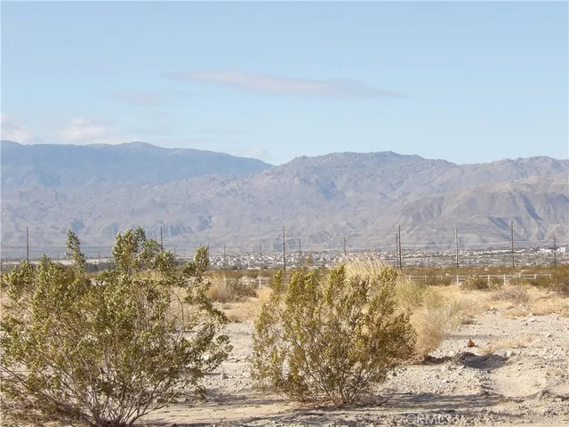 a view of a backyard of a house