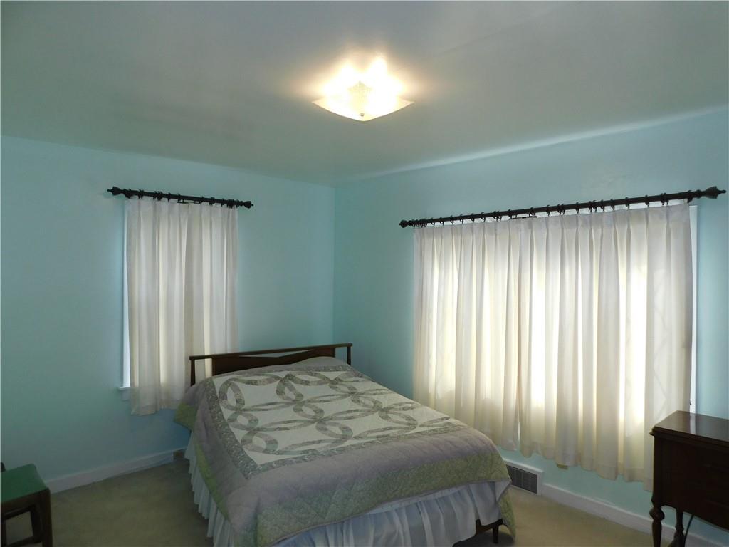 618 Morgantown Road Uniontown, PA 15401 - Photo 15 of 20 a bedroom with a bed and a window