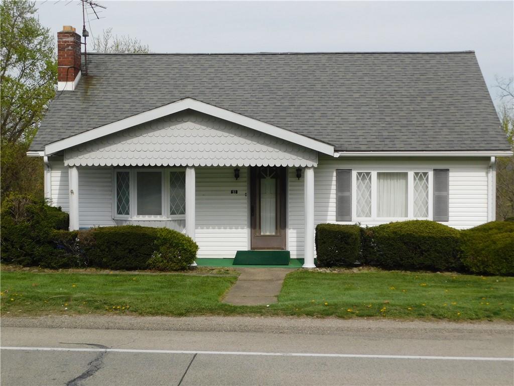 618 Morgantown Road Uniontown, PA 15401 - Photo 2 of 20 a front view of a house with a garden