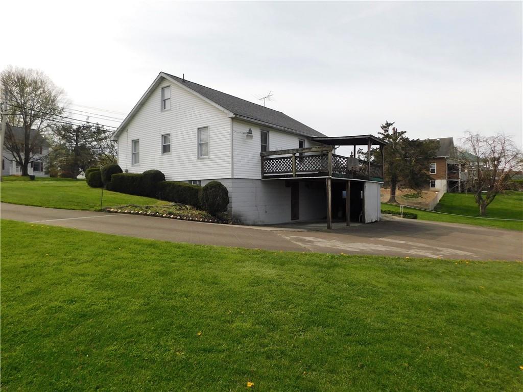 618 Morgantown Road Uniontown, PA 15401 - Photo 4 of 20 a front view of a house with a yard