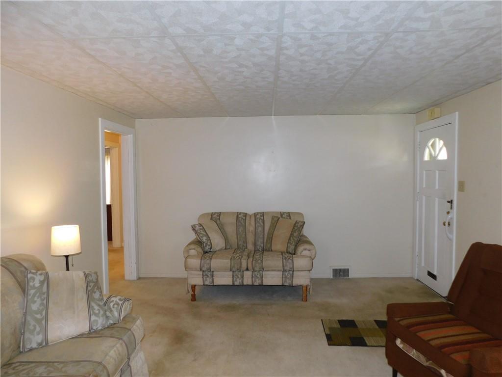 618 Morgantown Road Uniontown, PA 15401 - Photo 9 of 20 a living room with furniture and a couch