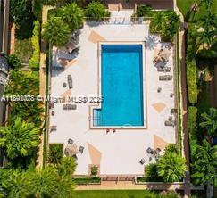 8305 Southwest 72nd Avenue, Unit 102A Miami, FL 33143 - Photo 15 of 18 an aerial view of a house with a yard large trees and brick walls