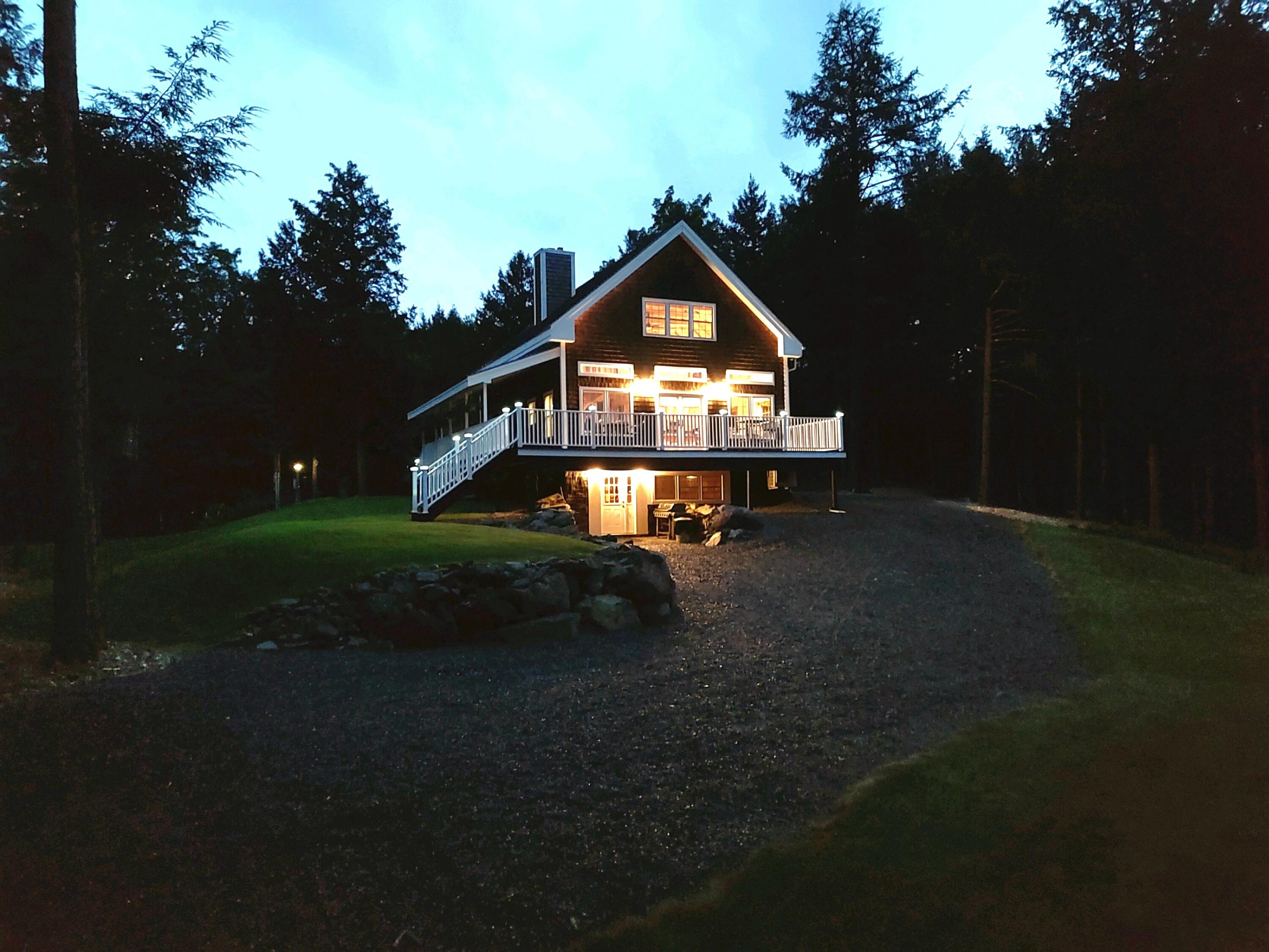 221 Rams Island Road Dover-Foxcroft, ME 04426 - Photo 70 of 75 Dusk View of Home from Lake