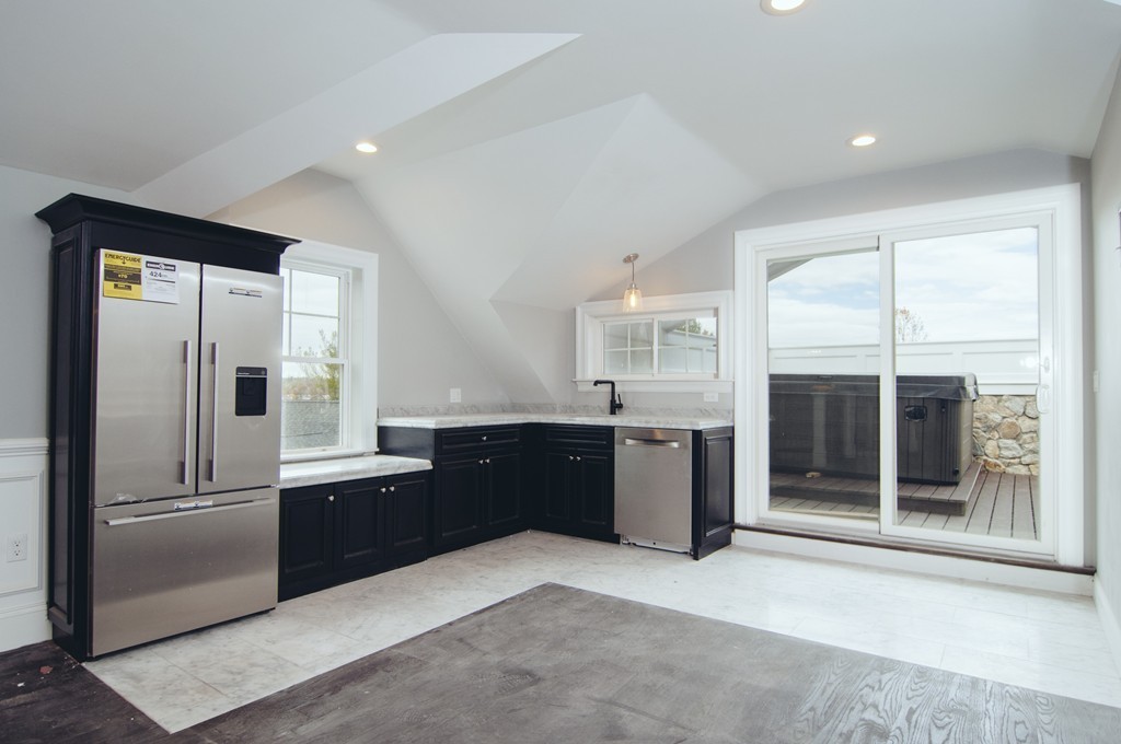 50 Beatrice Way Canton, MA 02021 - Photo 13 of 30 a kitchen with a refrigerator and a sink